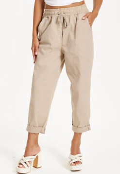 Beige Relaxed Fit Tapered Trousers