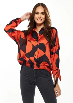 Liquorish Blouse with Oversized Polka Stripe Pattern in Red & Black