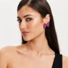 Liquorish Diamonte Bow Stud Earrings In Pink
