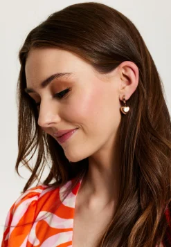 Liquorish Heart Earrings In Rose Gold
