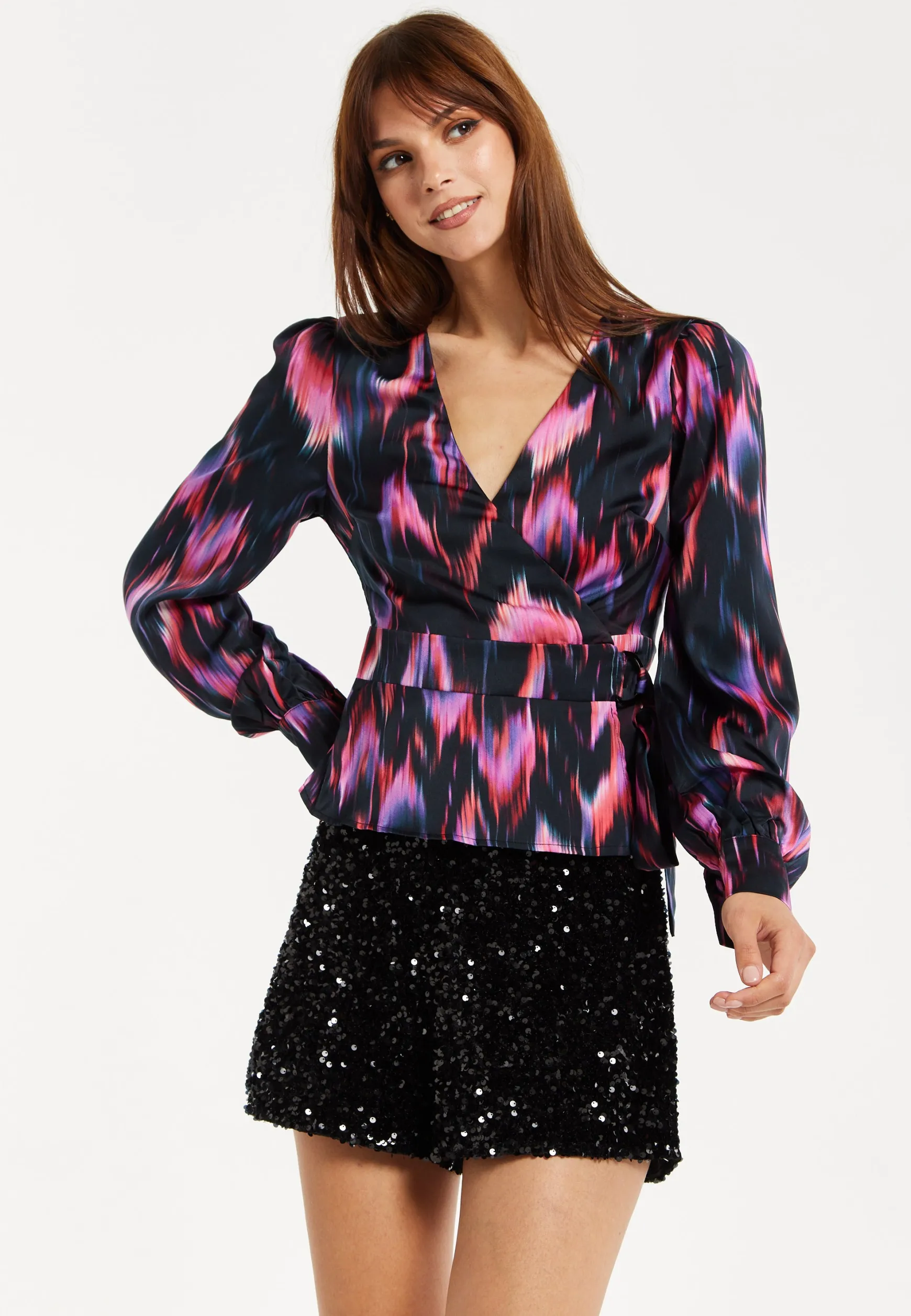 Women's Abstract Ikat Top in Black with Vibrant Feather Print, Long Balloon Sleeves, Button-Up High Neck Collar.