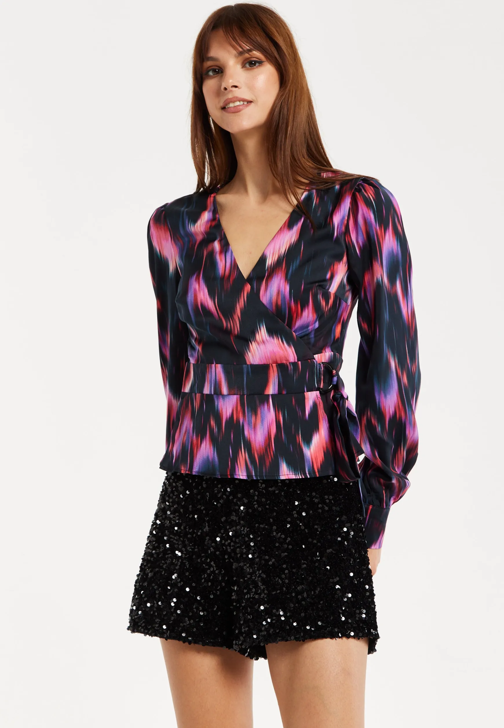 Women's Abstract Ikat Top in Black with Vibrant Feather Print, Long Balloon Sleeves, Button-Up High Neck Collar.