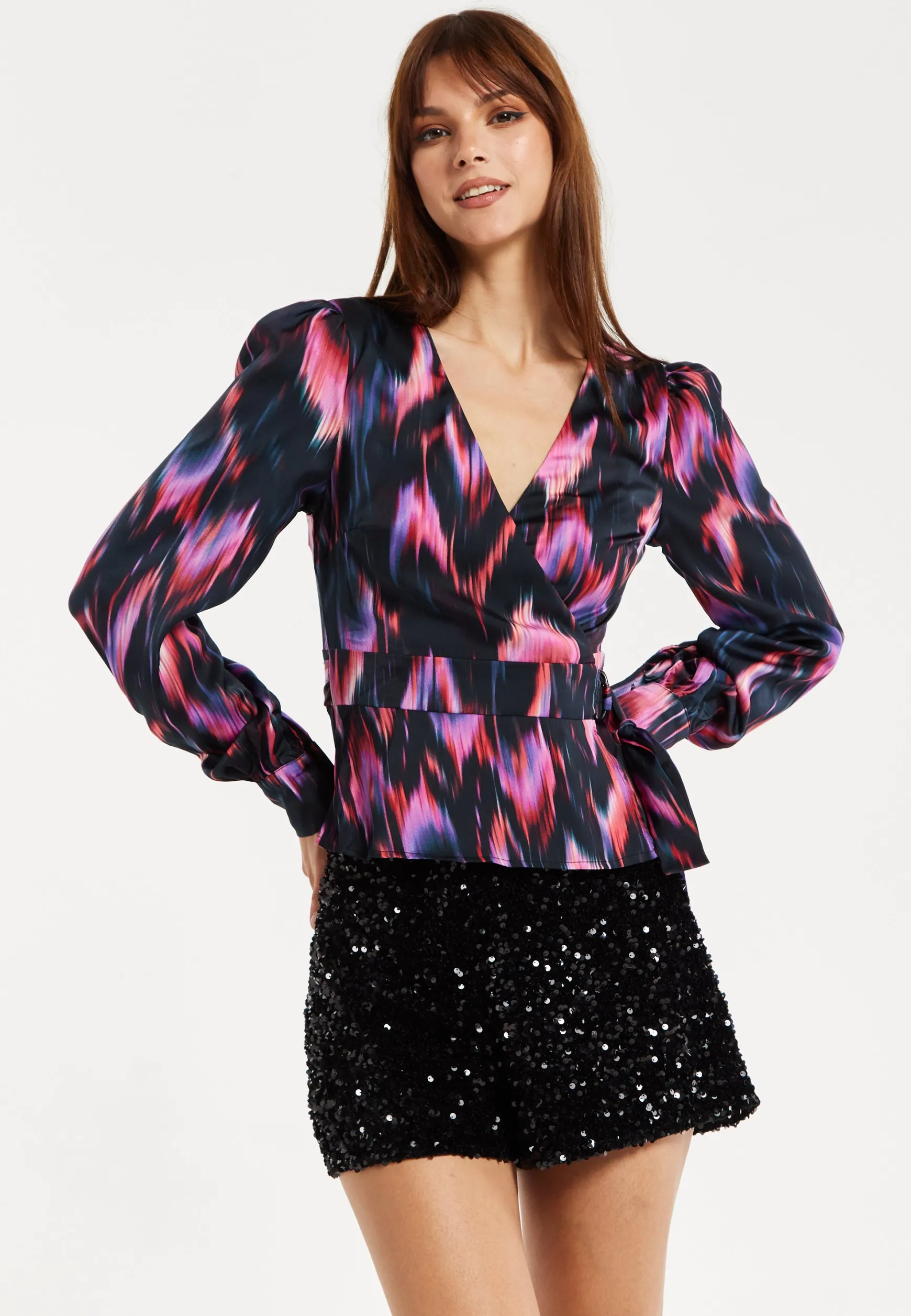 Women's Abstract Ikat Top in Black with Vibrant Feather Print, Long Balloon Sleeves, Button-Up High Neck Collar.