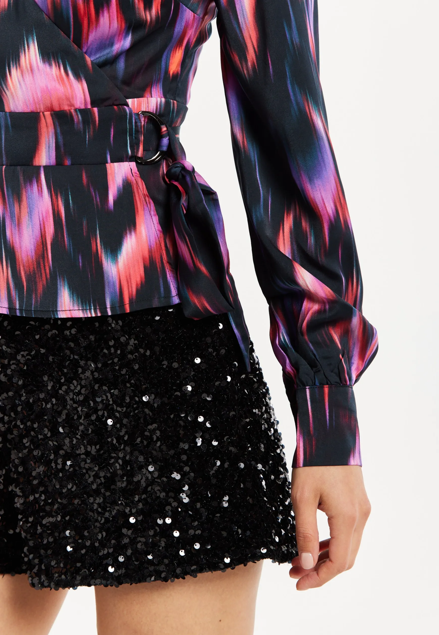 Women's Abstract Ikat Top in Black with Vibrant Feather Print, Long Balloon Sleeves, Button-Up High Neck Collar.