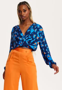 Women's Abstract Print Wrap Top In Pink, Orange, And Blue - Crossover Front, V Neck, Long Sleeves, Elasticated Waist