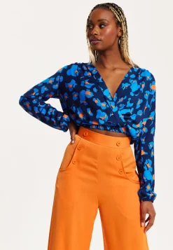 Women's Abstract Print Wrap Top In Pink, Orange, And Blue - Crossover Front, V Neck, Long Sleeves, Elasticated Waist