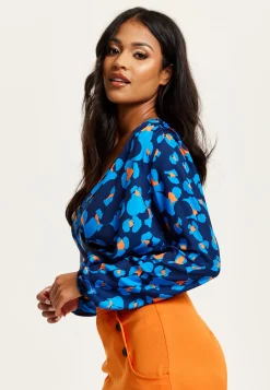 Women's Abstract Print Wrap Top In Pink, Orange, And Blue - Crossover Front, V Neck, Long Sleeves, Elasticated Waist