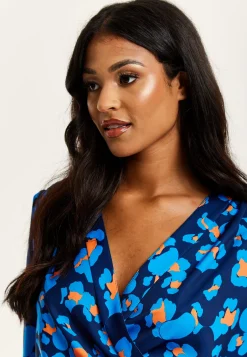 Women's Abstract Print Wrap Top In Pink, Orange, And Blue - Crossover Front, V Neck, Long Sleeves, Elasticated Waist