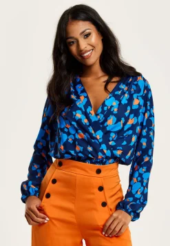 Women's Abstract Print Wrap Top In Pink, Orange, And Blue - Crossover Front, V Neck, Long Sleeves, Elasticated Waist
