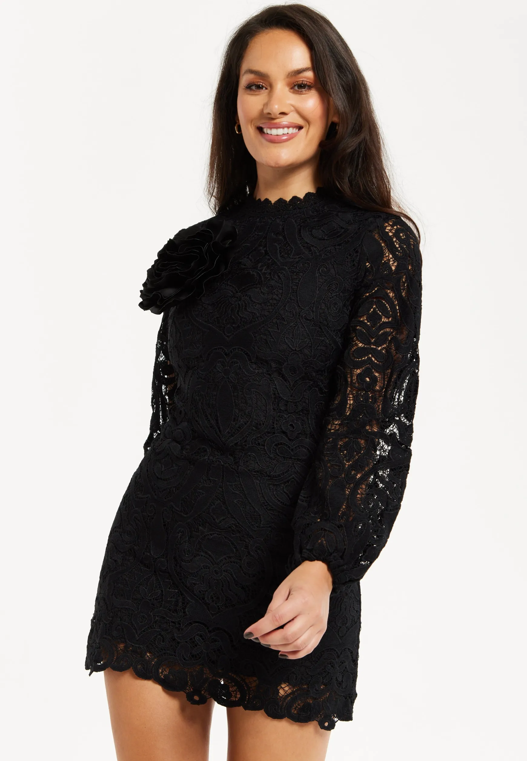 Women's Black Lace Mini Dress with Balloon Sleeves and Flower Detail - Elegant, Floral Embellishment, High Neckline.