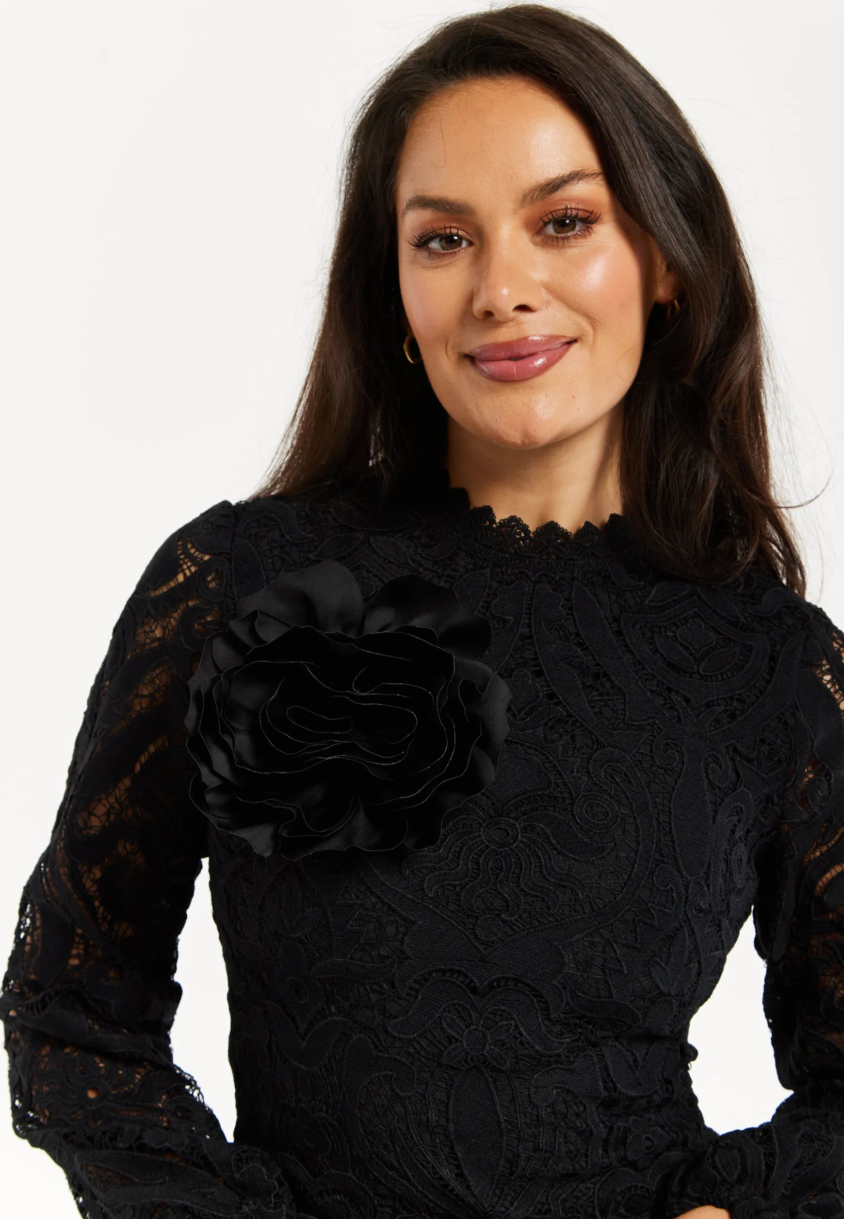 Women's Black Lace Mini Dress with Balloon Sleeves and Flower Detail - Elegant, Floral Embellishment, High Neckline.