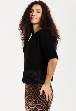 Women's Black Short Sleeves Jumper with Unique Hem Details for Comfortable Loose Fit