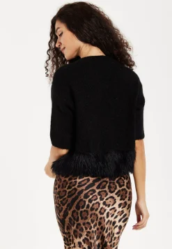 Women's Black Short Sleeves Jumper with Unique Hem Details for Comfortable Loose Fit