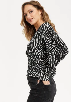 Women's Brushed Knit Mono Zebra Print Top - Long Sleeve, V Neck, Crossover Front, Regular Fit, Striking Pattern
