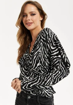 Women's Brushed Knit Mono Zebra Print Top - Long Sleeve, V Neck, Crossover Front, Regular Fit, Striking Pattern