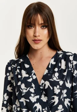 Women's Floral and Bird Print Navy Wrap Top with Long Sleeves, Crossover Front, and Elasticated Waist