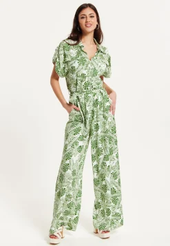 Women's Green Leaf Printed Loose Fit Jumpsuit with Tie Waist and Pocket Details - Liquorish