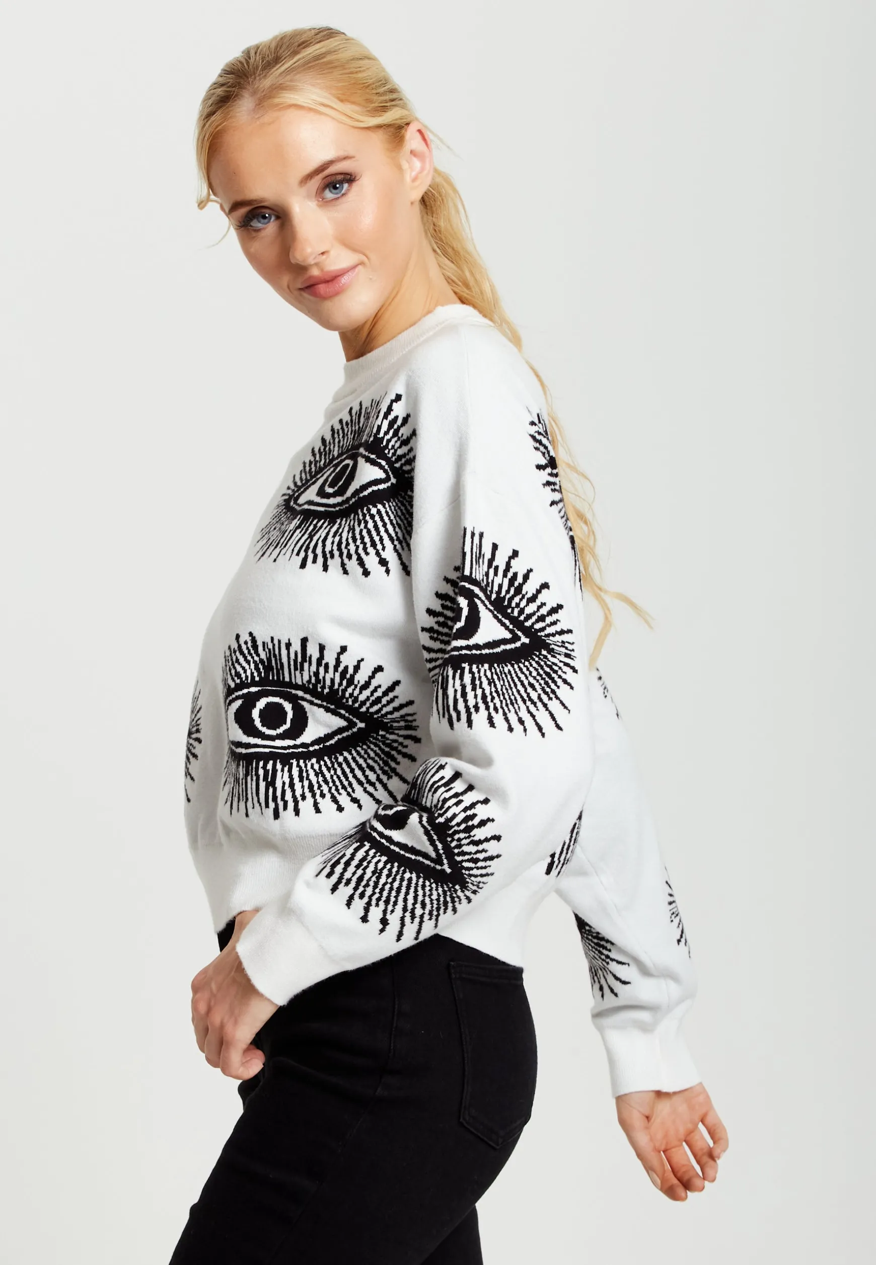 Women's Jumper in White with Long Sleeves and Distinctive Eye Pattern by Liquorish