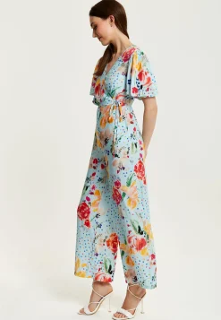 Women's Jumpsuit - Blue Floral Crossover V Neck with Tie Waist and Wide Legs - Liquorish