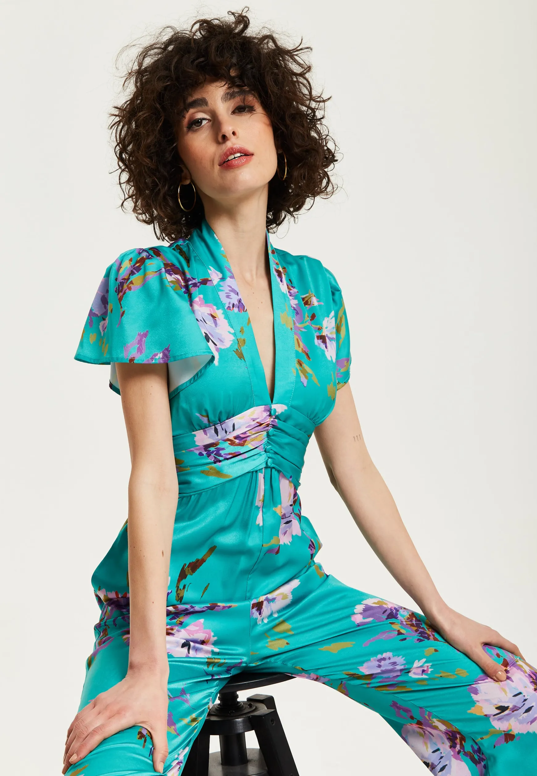 Women's Jumpsuit in Green Floral Print with Short Sleeves and V Neck - Regular Fit by Liquorish
