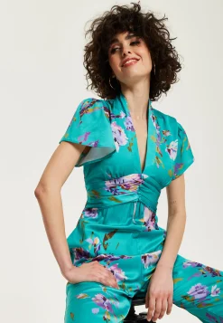 Women's Jumpsuit in Green Floral Print with Short Sleeves and V Neck - Regular Fit by Liquorish