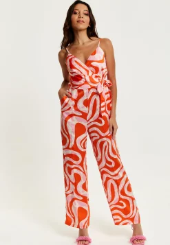 Women's Jumpsuit in Pink and Red Abstract Print with V Neck, Crossover Front, Tie Waist, Wide Legs - Liquorish