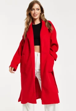 Women's Longline Red Coat with Notch Collar, Tie Waist, and Side Pockets - Relaxed Fit by Liquorish