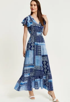 Women's Maxi Dress in Blue Tile Print with Short Sleeves and Open Back Tie Detail - Liquorish