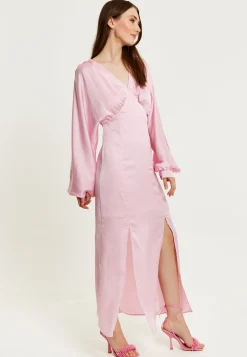 Women's Maxi Dress in Light Pink with Long Sleeve Slits - Elegant Design by Liquorish