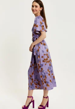 Women's Maxi Dress in Purple Floral with V Neck, Short Sleeves, Wrap Style, Midi Length - Liquorish