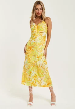 Women's Maxi Dress in Yellow and Orange Floral Print with Sleeveless Design and Ruching Detail - Liquorish