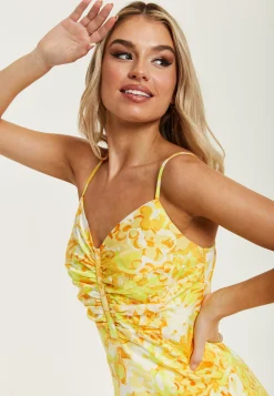 Women's Maxi Dress in Yellow and Orange Floral Print with Sleeveless Design and Ruching Detail - Liquorish
