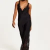 Women's Maxi Dress with Lace Detail, Deep V-Neck, and Flowing Silhouette in Black - Liquorish