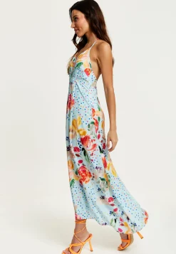 Women's Midi Dress in Blue with Floral Print, Sleeveless Asymmetrical Design and Open Back - Liquorish