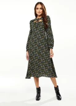 Women's Midi Dress in Green Floral with Long Puffy Sleeves and Neck Tie Detail - Liquorish