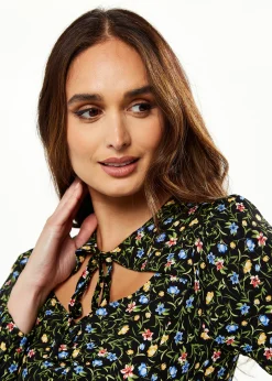 Women's Midi Dress in Green Floral with Long Puffy Sleeves and Neck Tie Detail - Liquorish