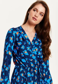 Women's Midi Wrap Dress in Blue with Long Sleeves - Elegant Abstract Print Design by Liquorish