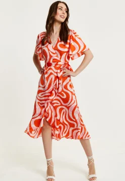 Women's Midi Wrap Dress in Pink and Red Abstract Print with Short Sleeves - Flattering V Neck and Tie Waist by Liquorish
