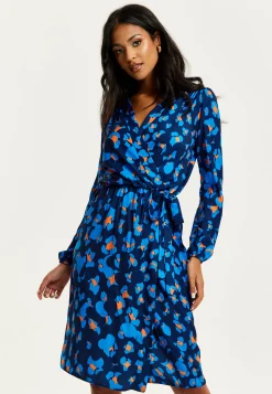 Women's Midi Wrap Dress in Blue with Long Sleeves - Elegant Abstract Print Design by Liquorish