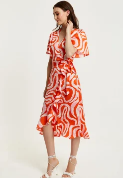 Women's Midi Wrap Dress in Pink and Red Abstract Print with Short Sleeves - Flattering V Neck and Tie Waist by Liquorish