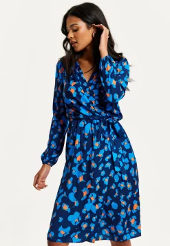 Women's Midi Wrap Dress in Blue with Long Sleeves - Elegant Abstract Print Design by Liquorish
