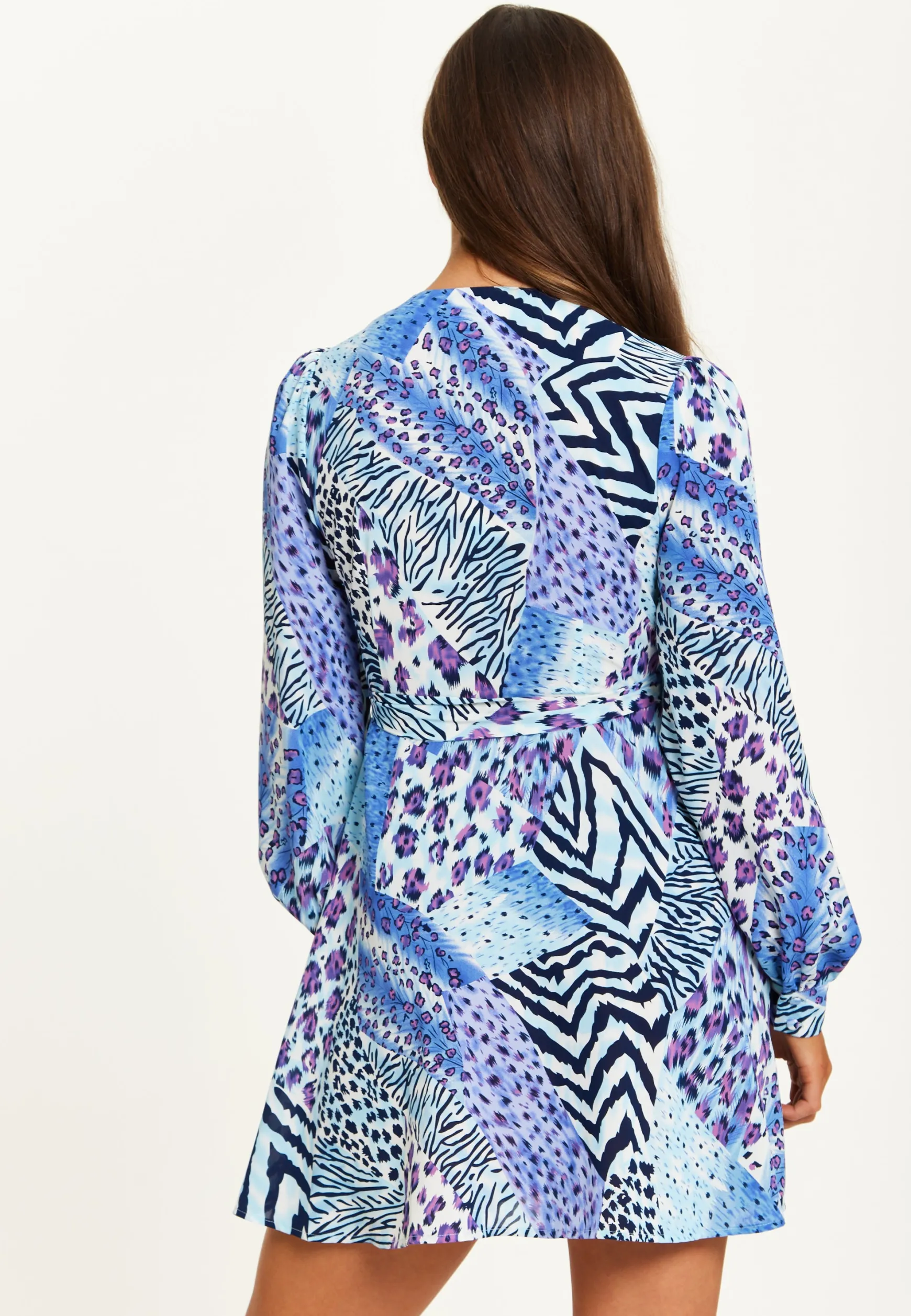 Women's Mini Dress in Blue with Long Sleeves and Mixed Animal Print Wrap Design - Liquorish