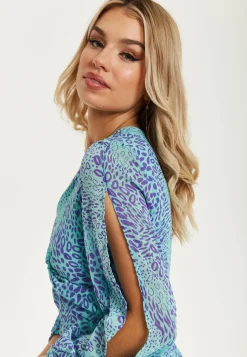 Women's Mini Dress in Blue with Long Sleeves and Knot Front Detail - Stunning Leopard Print by Liquorish