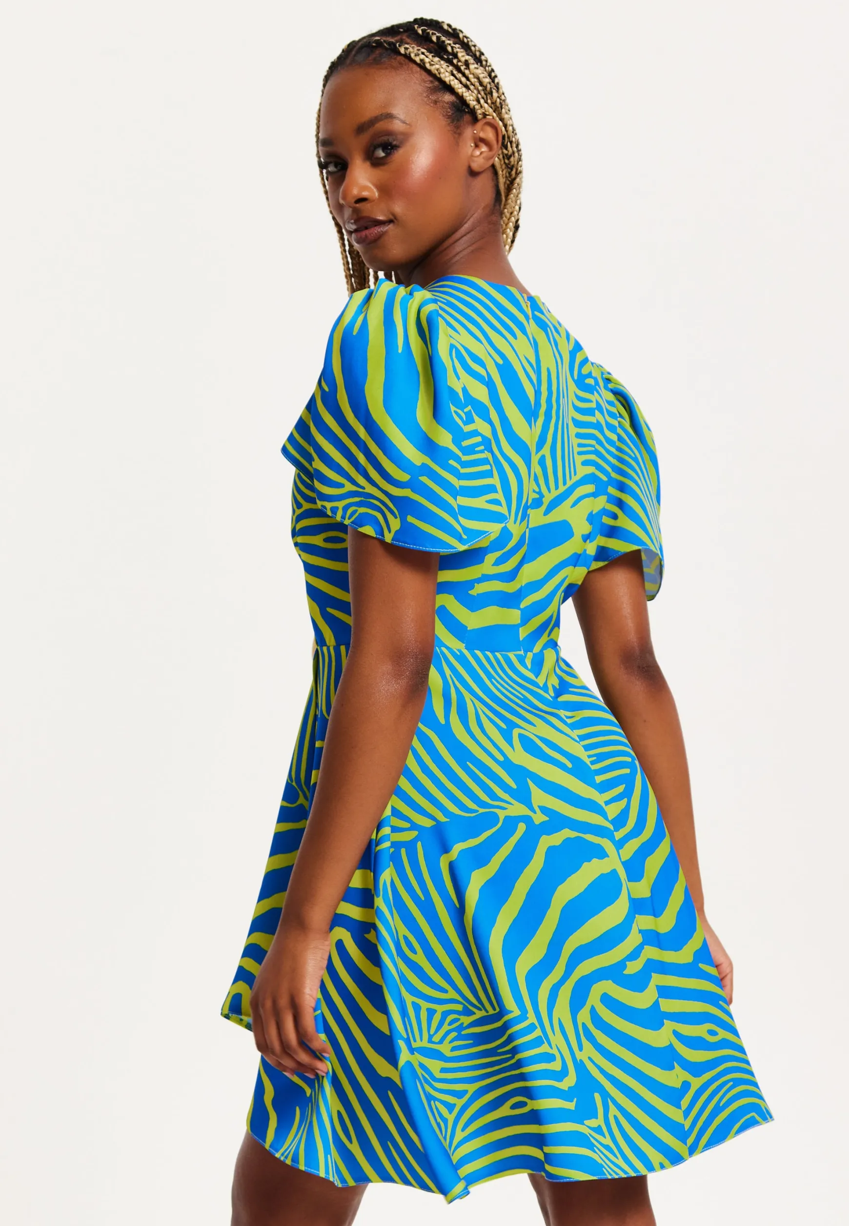 Women's Mini Dress in Multi-Coloured with Angel Sleeves and V Neck Design by Liquorish