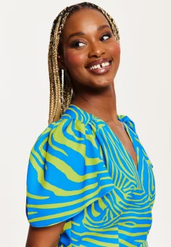 Women's Mini Dress in Multi-Coloured with Angel Sleeves and V Neck Design by Liquorish