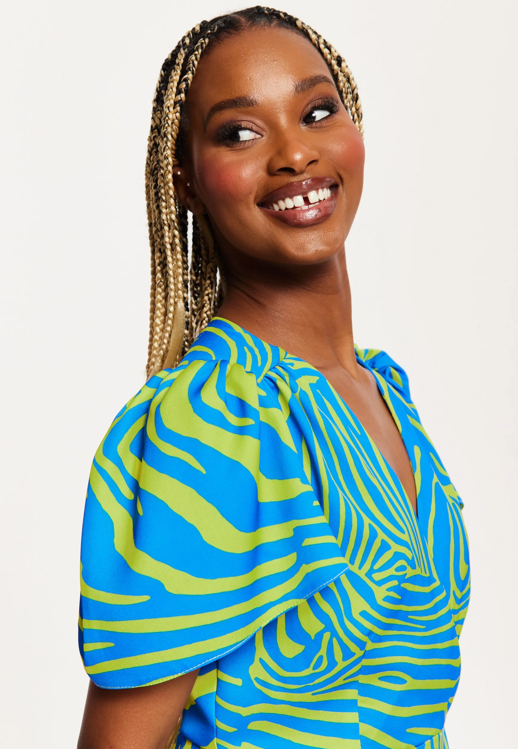 Women's Mini Dress in Multi-Coloured with Angel Sleeves and V Neck Design by Liquorish