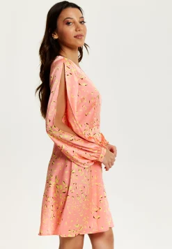 Women's Mini Dress in Peach with Slit Sleeves and Abstract Animal Print - Effortless Style by Liquorish