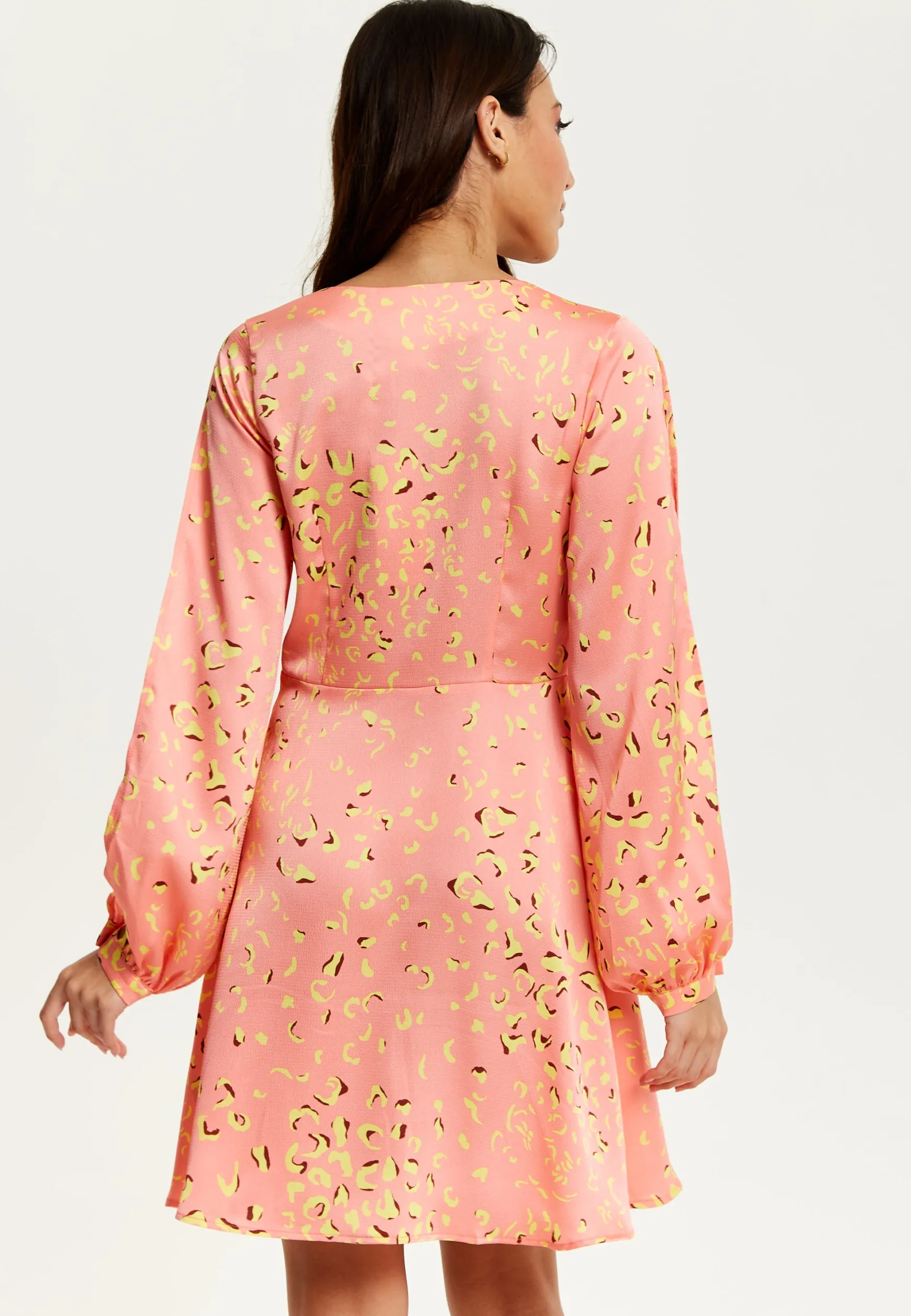 Women's Mini Dress in Peach with Slit Sleeves and Abstract Animal Print - Effortless Style by Liquorish