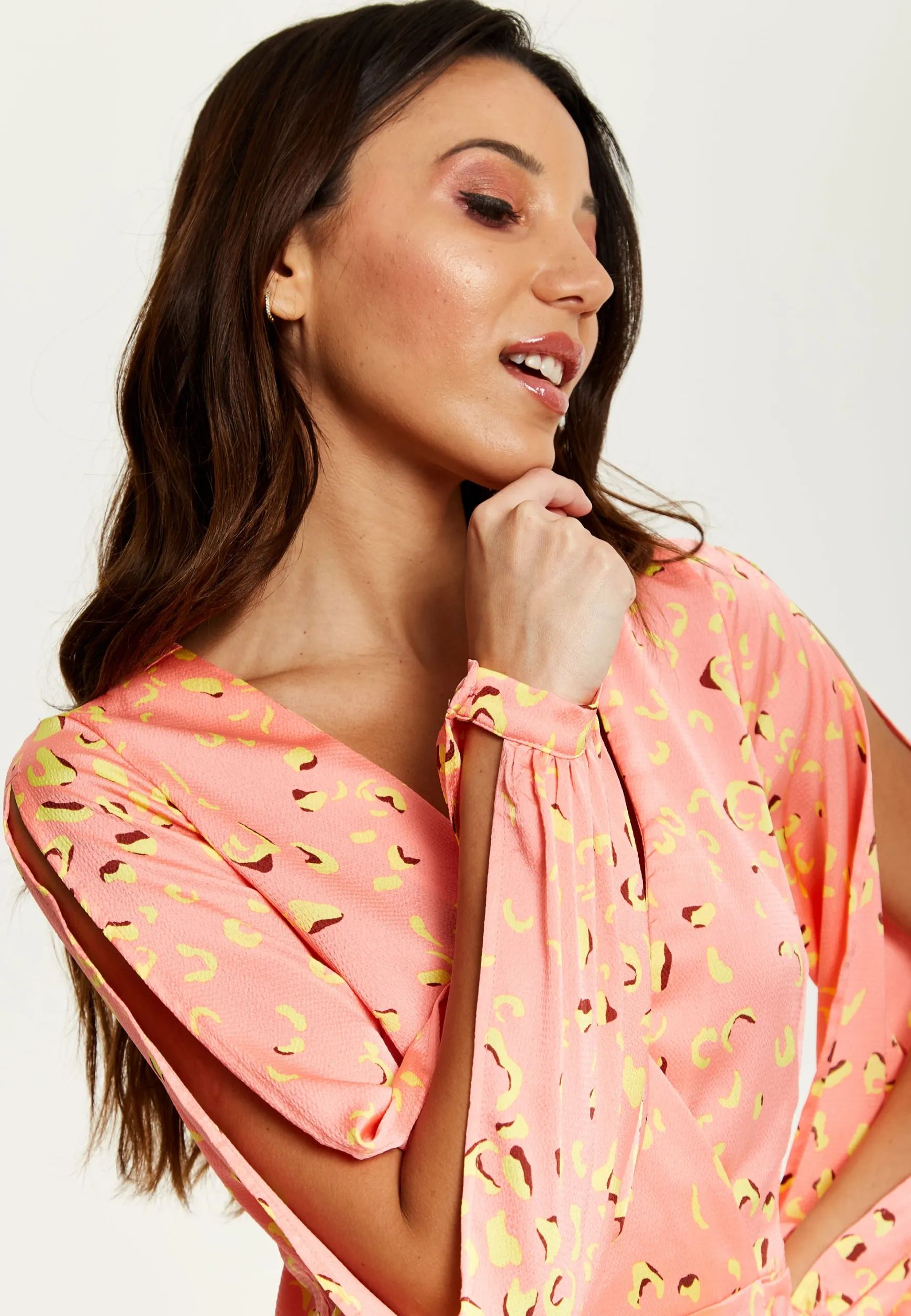 Women's Mini Dress in Peach with Slit Sleeves and Abstract Animal Print - Effortless Style by Liquorish