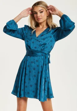 Women's Mini Dress in Petrol Blue with Long Sleeves, Black Star and Polka Dot Print Wrap Style by Liquorish